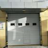 Puerta corredera industrial grande insonorizada se puede abrir puerta pequeña control remoto antirrobo elevación vertical reducción de ruido eficiente Ingeniería Especial