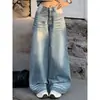 American retro washed denim jeans for men, featuring a curved hem, loose fit, wide legs, straight cut, and a stylish, clean look with a floor-length design