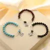 Pulsera de cuentas redondas de turquesa con cuentas de cristal blanco de moda diseño literario joyería de cuentas para mano de dama nicho venta al por mayor