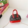 Bolso Infantil de Moda con Estampado de Leopardo 2026 Bolso de Mano Mini Concha para Niñas Bolso Cruzado de Cadena de Moda Nuevo Billetero