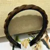 Accesorios para el cabello nuevos transfronterizos al por mayor tela de moda trenza retorcida diadema tejida con pedrería borde ancho diadema para lavar la cara y presionar el cabello