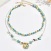Collar Bohemio Turquesa Estrella de Mar Caracola de Doble Capa Estilo Navideño Cadena para Clavícula Personalizada Joyería Transfronteriza Europea y Americana