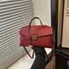 Bolso de mujer de alta gama 2026 verano nuevo bolso de hombro para el trabajo, bolso de hombro cruzado de diseño de nicho moderno y simple