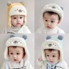 Gorro de invierno para bebé, súper lindo, con forro polar, protección para las orejas, para niños y niñas, grueso, cálido, gorro tipo Lei Feng para niños