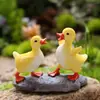 Decorações artificiais transfronteiriças de dois patinhos amarelos para lagos externos, pátios, jardins e ornamentos de resina para micro paisagismo