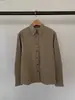 Corea del Sur Dongdaemun Underson 2026 Moda de Principios de Primavera Elegante Camisa de Manga Larga a Rayas con Botones
