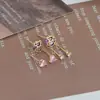 Aguja de plata S925 un juego de tres pares aretes de botón para mujer dormir sin quitarse oso amor pequeño aretes aretes de estudiante