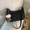 Bolso Transfronterizo para Axila para Mujer 2025 Nuevo de Moda Nicho Moda Lunares Lazo Bolso de Hombro Viajero Bolso Dumpling