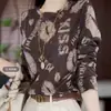 Nuevo top elegante de manga larga ajustado para la primavera y el otoño de 2026, moderno top básico para principios de otoño, top de capas para mujer