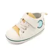 Zapatos de lona para bebé casuales suela suave zapatos para bebé láser interior para niños pequeños zapatos al por mayor 2751