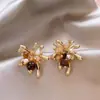 Pendientes de Perlas Color Uva Melard para Mujer 2025 Nuevos Pendientes Populares de Alta Gama Diseño Otoño e Invierno Clavijas