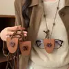 Clip para Gafas con Cadena de Suéter de Corazón de Gatito de Resina de Cuero Retro Estilo Étnico Nicho Sensación de Alta Gama Decoración Versátil