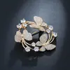 Suministro directo de fábrica anillo versátil simple broche de vestido de diamantes corsage de mariposa punto broche creativo de circón para mujer
