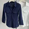 Camisa polo de manga sete-quartos acinturada cor sólida gola polo feminina estilo desejo puro design de temperamento sentido casual irregular curta