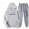 Novedad Otoño e Invierno 2024 Estilo Hombres y Mujeres Ebay Amazon Wish Moda Europea y Americana Tendencia Trajes Deportivos con Estampado de Corazones