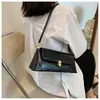 Bolsa de axila de alta qualidade com textura retrô para mulheres, nova bolsa de ombro de nicho francês 2025, bolsa baguette versátil e fashion