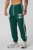 Pantalones Deportivos Nuevos para Hombre Youngla Gimnasio Bodybuilding Ejercicio Secado Rápido Transpirables Elásticos Casuales