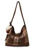 Bolsa de Lona Casual de Gran Capacidad para Mujer 2025 Nuevo Bolso Cruzado Versátil para Viajes Diarios Bolso Tote Relajado Bolso Cubo