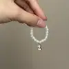 Mini Labubu Cuarta Generación Caja Sorpresa Ropa de Muñeca Collar Colgante Labubu 26 Letras Collar de Perlas Accesorios de Joyería