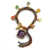 Pulseira do deus da riqueza de cinco vias estilo Xizang oito santos padroeiros cinco mestres Manjushri deus da riqueza amarelo thangka corda tecida à mão pulseira do ano desta vida