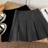 Nova Saia Plissada Slimming de Cintura Alta Estilo Coreano Estilo College Anti-Exposição Curta Linha A para Mulheres Primavera 2025