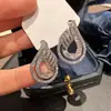 Brincos Populares de Alta Qualidade Shein de Cao Shi para Mulheres, Brincos com Design Vazado de Gota d'Água, Moda Urbana de Luxo Leve