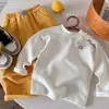 Ropa interior de capa base para niños y niñas 2026 Ropa nueva de invierno Cuello semi-alto Camiseta de manga larga para niños Polar térmico Cálido Otoño Invierno