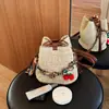 Moda Versátil de Alto Padrão Transfronteiriça Verão 2026 Novo Design de Nicho Exquisita Bolsa de Ombro Transversal Balde para o Dia a Dia