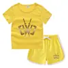 Camiseta de cuello redondo para niños, pantalones cortos, camiseta informal coreana, conjunto de camiseta interior absorbente de sudor, de caramelo, de verano 2023