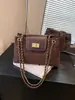 2026 Nova Bolsa Grande Acolchoada com Corrente Estilo Coreano Retro Diamante Texturizada para Mulheres para o Trabalho Ombro Único Transversal Bolsa de Mão Tendência