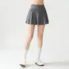 Saia Esportiva Dupla Camada Franzida Feminina Cintura Alta Controle de Barriga Anti-Exposição Fitness Tenis Skort Corrida Yoga Saia
