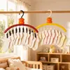 Colgador multi-clip con forma de caqui para ropa de bebé, tendedero y organizador para ropa interior y calcetines de uso doméstico