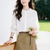 Camisa branca bordada estilo francês para mulheres, manga longa para outono, gola redonda com babados, mangas bufantes, corte solto, modelagem que afina a silhueta, top elegante