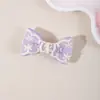 El nuevo accesorio para el cabello transfronterizo de Amazon para niños es un exquisito pasador de lazo para el cabello para niñas, adecuado para flequillos laterales y como adorno para el cabello.