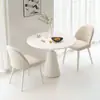 Mesa redonda pequeña de estilo nórdico blanca de moda con superficie de losa de roca, adecuada para cafeterías de té de leche y café, juego de mesa y sillas para comedor