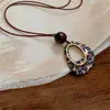 Collar de cordón de cuero estilo étnico con madera y acrílico, diseño único, cadena para suéter con estampado de leopardo, sensación de lujo ligero y alta gama, accesorio para mujer