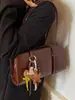 Moda Retro Bolso de Axila para Mujer Otoño 2025 Nuevo Bolso Baguette de Aspecto Elegante Bolso de Mano/Hombro Estilo Occidental de Moda