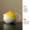 Tetera de cerámica Xishi pintada a mano con esmalte debajo y filtro en forma de bola, diseñada para uso doméstico, con un juego de té estilo chino en una caja de regalo