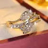 Anillo de moda con ramas y hojas entrelazadas incrustadas Venta caliente Sensación de alta gama Lujo ligero Temperamento exquisito Anillo de dedo versátil