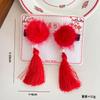 Pasador clásico de borla de bola de pelo para niños Tocado de saludo de Año Nuevo Pasador de felpa versátil Hanfu Pasador festivo rojo de Año Nuevo