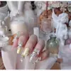 Arte de Uñas Mariposa Tridimensional Perla de Moda Nuevo DIY Piedra Triturada Irregular Paquete de Materiales Mixtos Cuentas Aurora Decoración