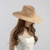 Europa y Estados Unidos transfronterizo súper ventas moda casual tejido a mano rafia flor hueca sombrero de paja exterior playa protector solar