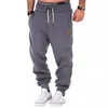 2023 nuevos pantalones deportivos de entrenamiento de costura para hombre de otoño e invierno, leggings, pantalones de fitness deportivos para hombre