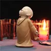 Pequeno sofá reclinável Maitreya ornamentos de lazer armário de TV doméstico decorações interessantes chinesas artesanato de resina fabricantes atacado
