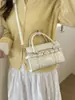 Bolsa de Mão Quadrada Pequena Casual Simples para Mulheres 2026 Nova Moda Primavera Versátil Bolsa de Ombro Transversal de Alta Qualidade