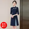 Vestido profesional estilo chino con cuello abotonado y manga media para mujer, adecuado para primavera y otoño, nueva vestimenta de trabajo estilo chino para recepción de hotel con bordado