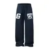Pantalones largos versátiles, cálidos y cómodos, de estilo americano, bordados y estampados, de pierna ancha, corte relajado, para hombre y mujer, de la fábrica Xingyufang, pants casuales