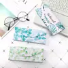 Atacado personalizado masculino e feminino estudante Coreia do Sul pequeno fresco fofo personalidade criativa portátil dobrável triângulo caixa de óculos fabricantes