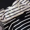 Camiseta Básica de Punto Rayado para Mujer Otoño Temprano 2026, Corte Holgado, Cuello Redondo, Casual, Versátil, Suave y Cómoda, Manga Larga para Mujer