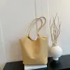Bolso de gran capacidad con textura tejida para mujer, nuevo de principios de otoño 2026, sensación holgada, bolso tote de moda, color sólido, elegante bolso de hombro único